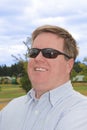 Happy young man in sunglasses. Royalty Free Stock Photo