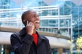 Happy young man talking on mobile phone Royalty Free Stock Photo