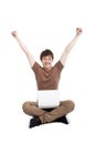 Happy young man using laptop Royalty Free Stock Photo