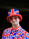 Happy young man wearing union jack dress
