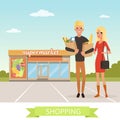 Happy young man and woman flat cartoon characters. People standing in front of supermarket with paper bags and products Royalty Free Stock Photo