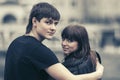 Happy young couple in love hugging in city street Royalty Free Stock Photo