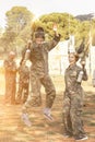 Happy young man and woman in full paintball gear having fun afte Royalty Free Stock Photo