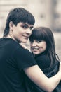 Happy young couple in love hugging in city street Royalty Free Stock Photo