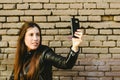 Happy young millennial woman making selfies to herself while dreaming of flirting with the boy she is in love with when uploading Royalty Free Stock Photo