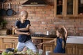 Happy young mom with cancer and daughter kid dancing