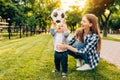 Happy young mom and her little son play soccer together outdoors Royalty Free Stock Photo