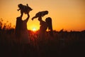 Happy young moms playing with their kids outdoors in summer. Happy family time together concept. selective focus Royalty Free Stock Photo