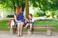 Happy young mother and adorable toddler girl walking through sum Royalty Free Stock Photo