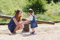 Happy young mother and adorable toddler girl walking through sum Royalty Free Stock Photo