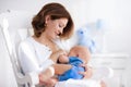 Happy young mother with baby boy at home Royalty Free Stock Photo