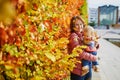 Woman and baby girl outdoors in park Royalty Free Stock Photo