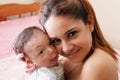 Happy young mother holding a baby Royalty Free Stock Photo