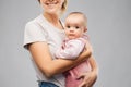 Happy young mother holding little baby daughter Royalty Free Stock Photo