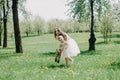 Happy young mother playing and having fun with her little baby son on sunshine warm spring or summer day Royalty Free Stock Photo