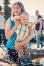 Happy mother and toddler son near the fountain Royalty Free Stock Photo