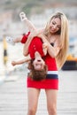 Happy young mother with a young daughter near Yacht Club Royalty Free Stock Photo