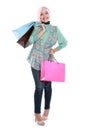 Happy young muslim woman with shopping bag Royalty Free Stock Photo