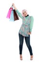 Happy young muslim woman with shopping bag Royalty Free Stock Photo