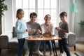 Portrait of cheerful full family involved in hobby activity. Royalty Free Stock Photo