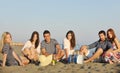 Happy young people group have fun on beach Royalty Free Stock Photo