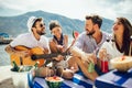 Young people having fun at beach party Royalty Free Stock Photo