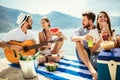 Young people having fun at beach party Royalty Free Stock Photo