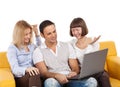 Happy young people with laptop computer Royalty Free Stock Photo