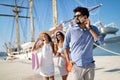 Happy young friends on luxury vacation. Travel, shopping, fun, friends concept