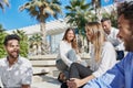 Happy young people relax on business trip outside