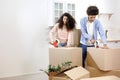 happy young people relocating to new home. purchase of residence, mortgage or rental. Royalty Free Stock Photo