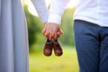 Happy and young pregnant couple walking outdoor Royalty Free Stock Photo