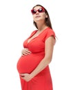 Happy young pregnant woman in red Royalty Free Stock Photo