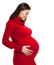 Happy young pregnant woman in red dress Royalty Free Stock Photo