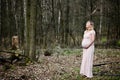 Happy young pregnant woman relaxed in the park Royalty Free Stock Photo