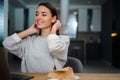 Happy young woman working with laptop and drinking coffee at home Royalty Free Stock Photo