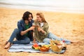 Happy Young Romantic Couple Drinking Wine And Enjoying Picnic Outdoors Royalty Free Stock Photo