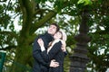 Happy romantic couple hugging in park Royalty Free Stock Photo
