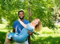 Happy young romantic couple in love. Black man and white woman. Love story and people`s attitudes. Beautiful marriage concept.