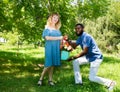 Happy young romantic couple in love. Black man and white woman. Love story and people`s attitudes. Beautiful marriage concept. Royalty Free Stock Photo