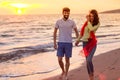 Happy young romantic couple in love have fun on beautiful beach at beautiful summer day Royalty Free Stock Photo