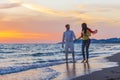 Happy young romantic couple in love have fun on beautiful beach at beautiful summer day Royalty Free Stock Photo