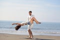 Happy young romantic couple in love have fun on beautiful beach at beautiful summer day. Royalty Free Stock Photo