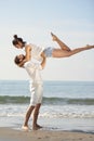 Happy young romantic couple in love have fun on beautiful beach at beautiful summer day. Royalty Free Stock Photo