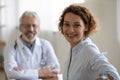 Female patient satisfied with checkup meeting in clinic. Royalty Free Stock Photo