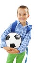 Happy young school boy holding a football Royalty Free Stock Photo