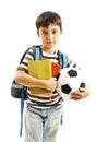 Happy young school boy holding a football Royalty Free Stock Photo