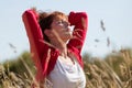 Happy young senior woman in harmony with nature Royalty Free Stock Photo