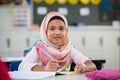 Young girl in hijab at school