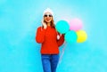 Happy young smiling woman holds an air balloons Royalty Free Stock Photo